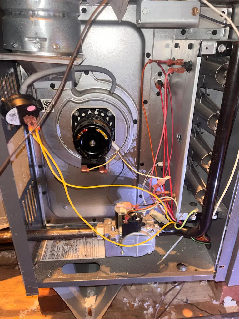 Furnace burner assembly and inducer motor during repair